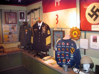 Battle of the Bulge Display at the Veterans Memorial Museum in Huntsville TX--You're in the Army Now, 1943 Mel Montgomery, father-in-law of Mari Montgomery of Mari Montgomery Realty fights in the Battle of the bulge Battle of the Bulge Display at the Veterans Memorial Museum in Huntsville TX--You're in the Army Now, 1943 Mel Montgomery, father-in-law of Mari Montgomery of Mari Montgomery Realty fights in the Battle of the bulge
